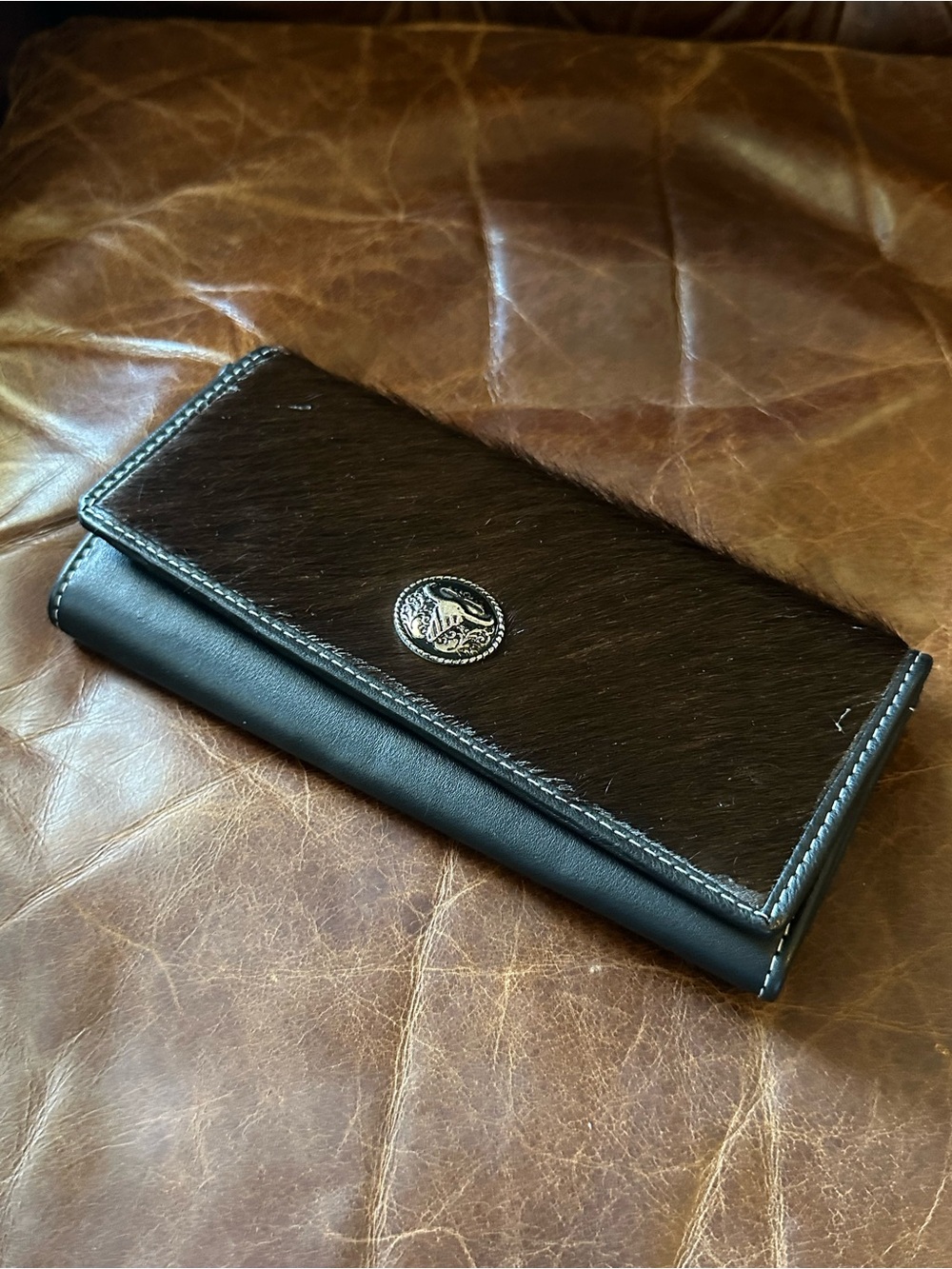 Women’s Black Continental leather Wallet with Silver Emblem